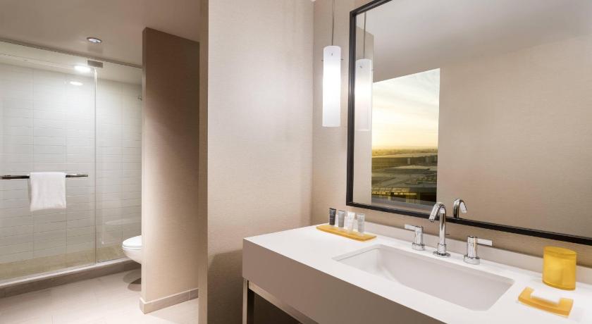 Image of Queen Room With Two Queen Beds and City View - Hearing Accessible 1