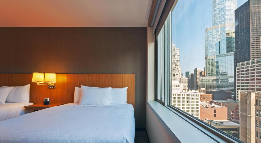 Image of Two Queen Beds City View (with Sofa Bed) 1