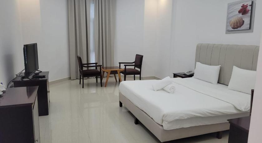 Image of Deluxe King Room with Sea View and ‎Balcony 15