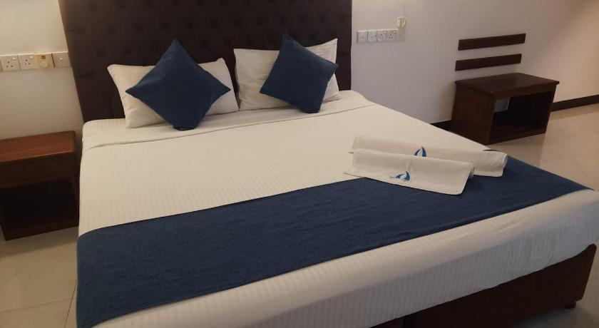 صورة غرفة ديلوكس ثلاثية مطلة على البحر (Deluxe Triple Room with Sea View) 3
