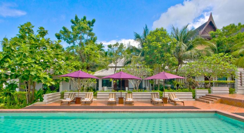 a patio area with a pool, chairs, and umbrellas, Anyavee Tubkaek Beach Resort (SHA Extra Plus) in Krabi