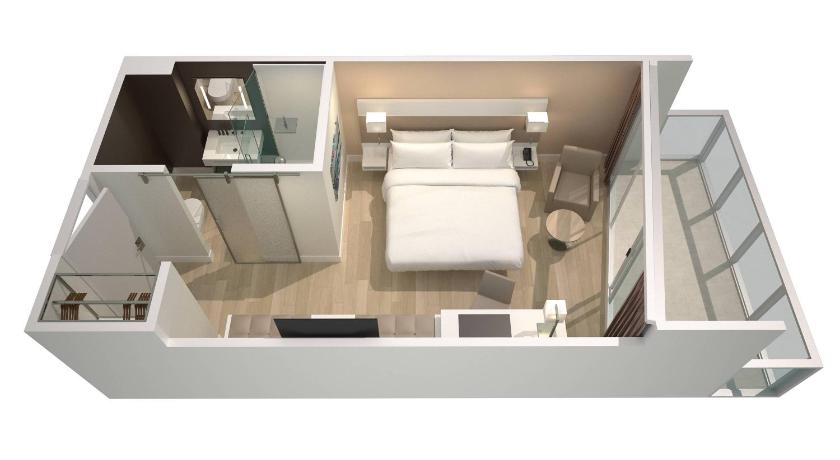 Immagine di Camera King con Balcone e Vasca - Accessibile a Ospiti Disabili/Ipoudenti (King Room with Balcony and Tub - Mobility/Hearing Accessible) 4