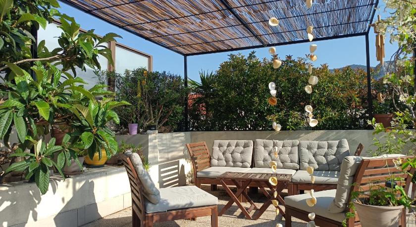 Chambre calme ouvrant sur magnifique rooftop