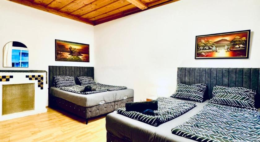 Comfortable Private Rooms in 4BR Apartment Near FAC Platz
