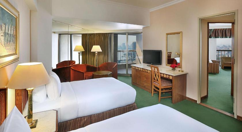Image of Twin Corner Room with City View 3