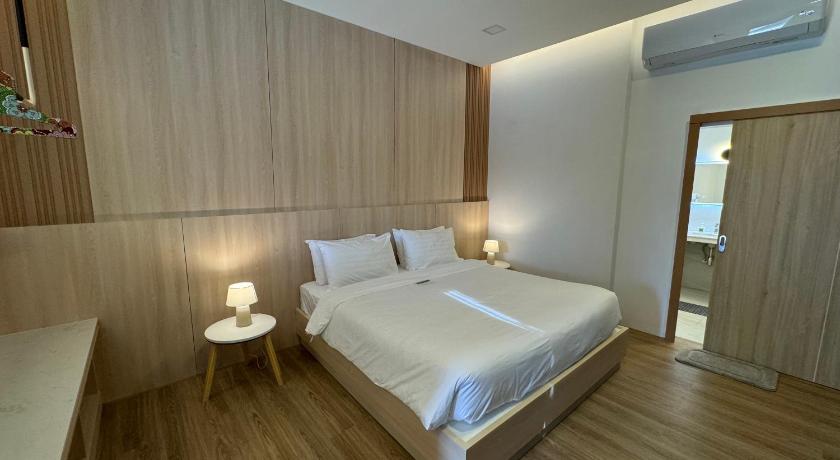 รูปของห้องดีลักซ์เตียงใหญ่หรือเตียงแฝดพร้อมวิวเมือง (Deluxe Double or Twin Room with City View) 0