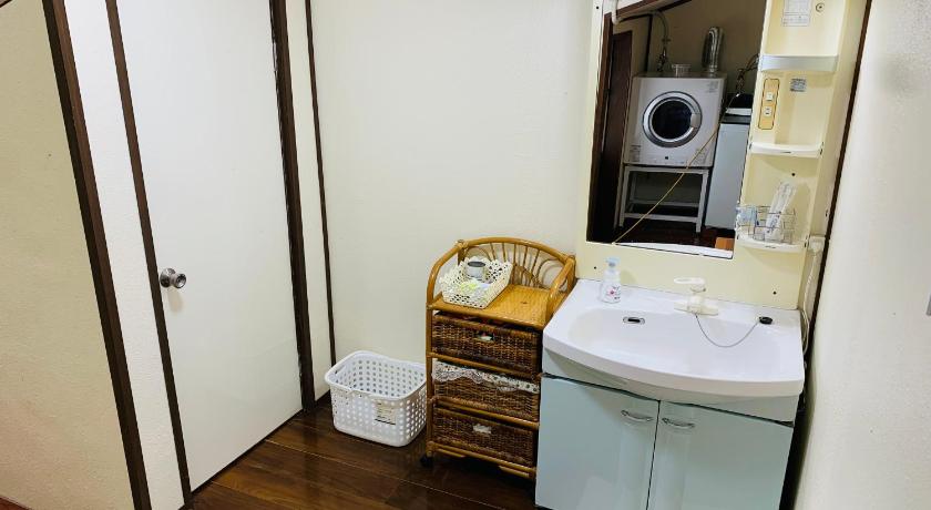 오키나와 본섬 広い畳間と外には広いウッドデッキCondominium和風邸Yanbaru 숙소 수영장