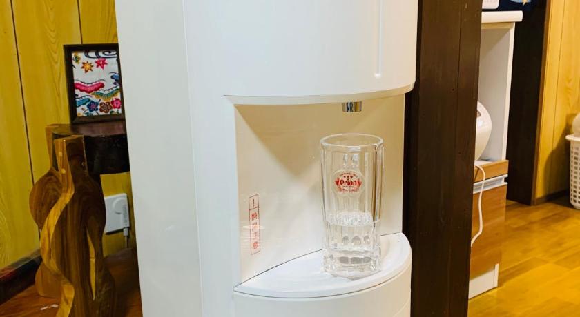 오키나와 본섬 広い畳間と外には広いウッドデッキCondominium和風邸Yanbaru 숙소 객실