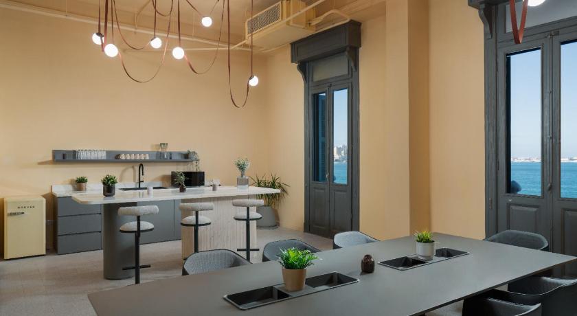 grey l studio apartments Corniche Alexandria Little Venice - image 3
