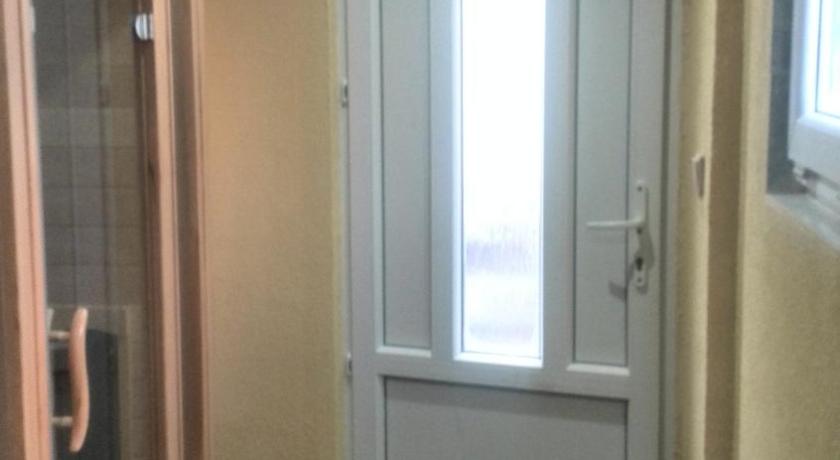 a small room with a door open to a hallway, Ubytovani Lumik in Jeseník