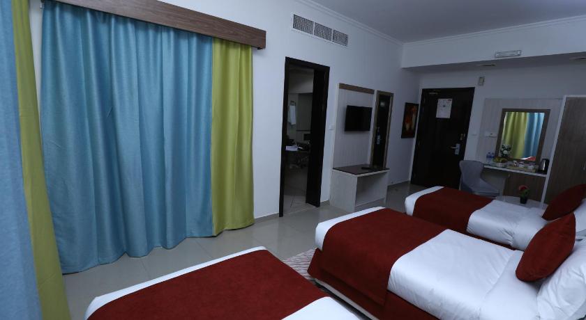 Image of Deluxe Triple Room with Balcony 14