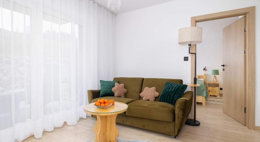 Spokojna Cozy Apartment with Patio & Parking in Wisla by Noclegi Renters