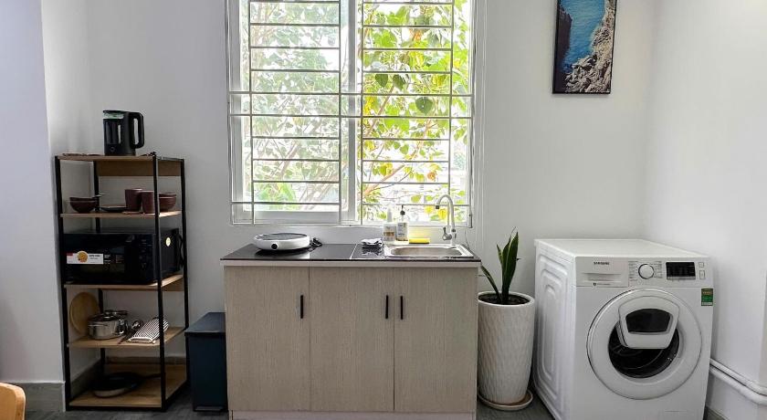 ホーチミン Cozy Saigon Sunset Apartment - Steps to Bui Vien 3つ星 ホテル レストラン