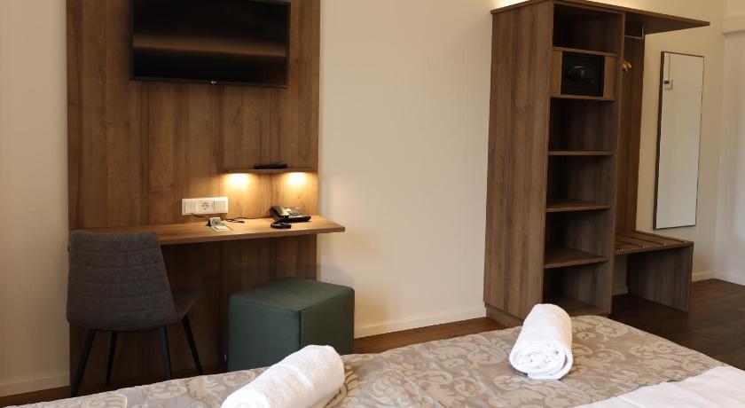 Plusz szoba kétszemélyes ággyal – kertre nyíló kilátással (Double Room Plus with Garden View) fotója 10