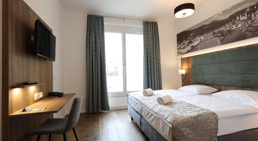 Plusz szoba kétszemélyes ággyal – kertre nyíló kilátással (Double Room Plus with Garden View) fotója 0