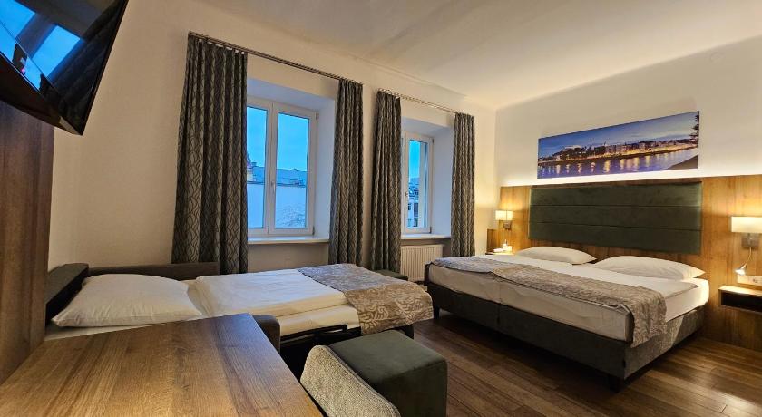 Komfort háromágyas szoba plusz (Comfort Triple Room Plus) fotója 1