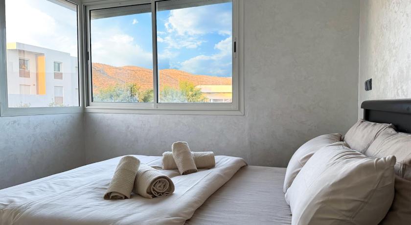 Taghazout Luxe Appartement - vue sur montagne Plage, Piscine & Jeux pour Enfants 4-Star Single Room lobby