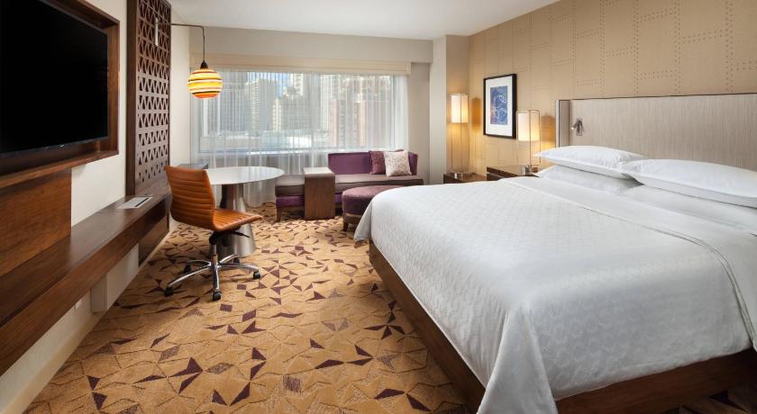 Image of King Room with Roll-in Shower - Mobility and Hearing Accessible 1