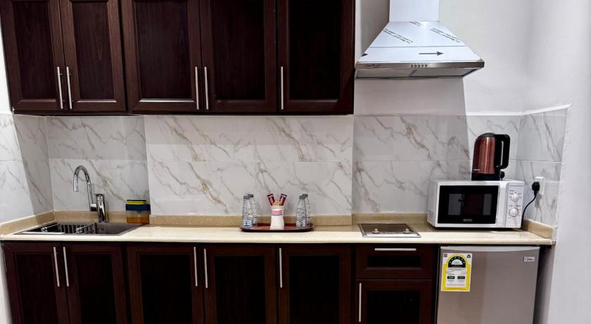 ダンマーム Capital O 145 Sendan Residence 3つ星 ホテル レストラン