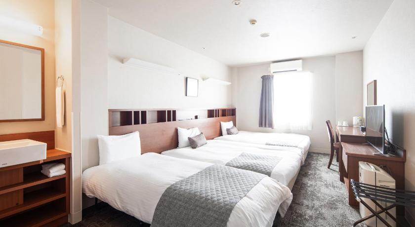 Foto Kamar Twin dengan Ranjang Tambahan - Bebas Asap Rokok (Twin Room With Extra Bed Non-Smoking) 0
