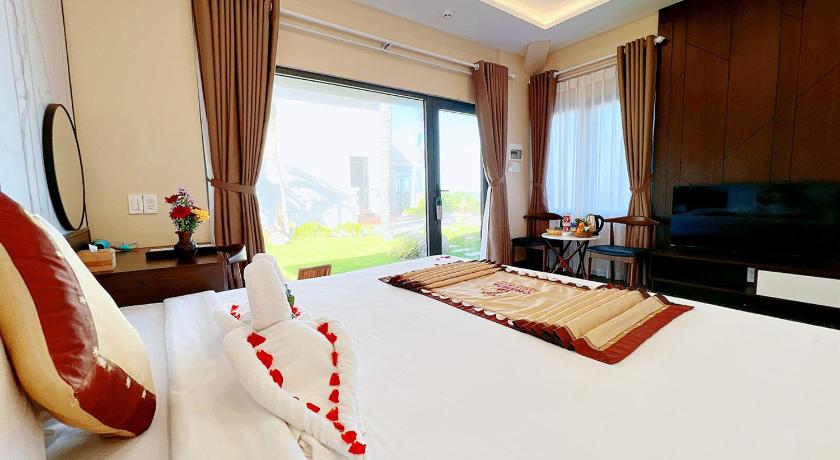 Ảnh của Phòng Deluxe Giường Đôi Nhìn Ra Biển Từ Phía Bên Cạnh (Deluxe Double Room with Side Sea View) 3
