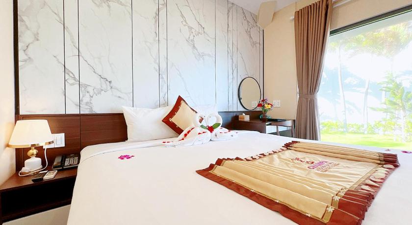 Ảnh của Phòng Deluxe Giường Đôi Nhìn Ra Biển Từ Phía Bên Cạnh (Deluxe Double Room with Side Sea View) 8