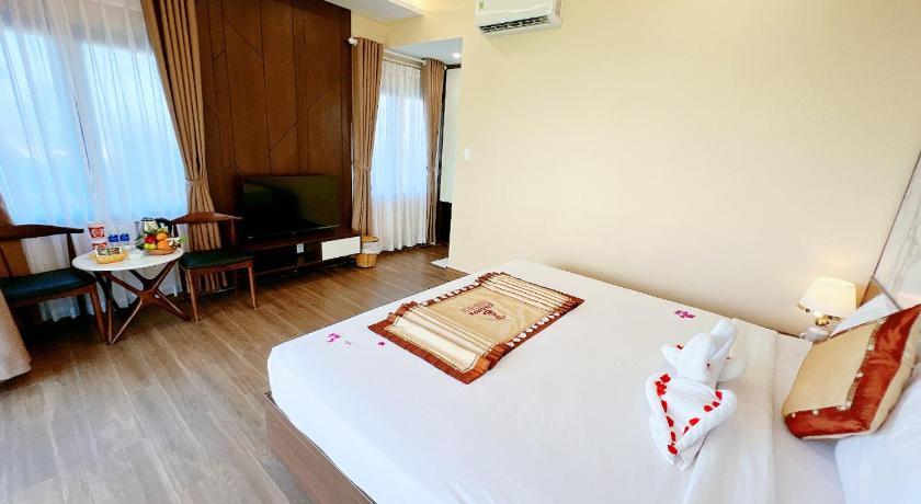 Ảnh của Phòng Deluxe Giường Đôi Nhìn Ra Biển Từ Phía Bên Cạnh (Deluxe Double Room with Side Sea View) 6