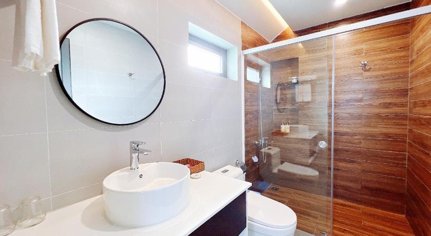 Ảnh của Phòng Deluxe Giường Đôi Nhìn Ra Biển Từ Phía Bên Cạnh (Deluxe Double Room with Side Sea View) 7