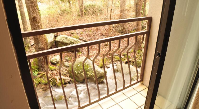 Image of 2 Full-Size Beds with Creekside Balcony - No Pets 11