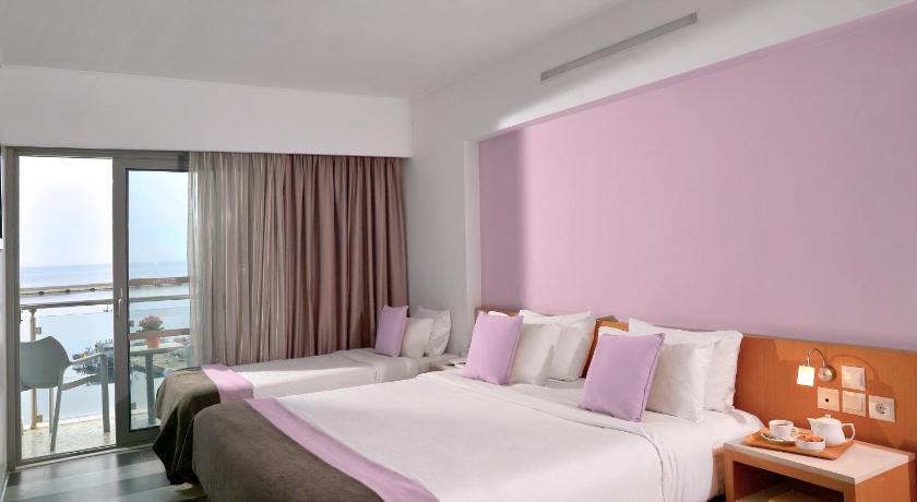 Image of Triple Room with Sea View 0