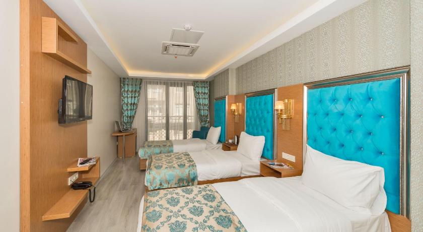 Image of Deluxe Quadruple Room 10