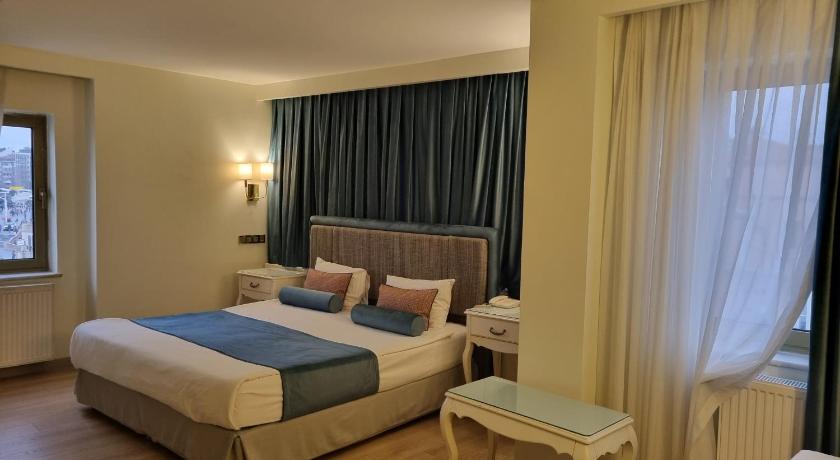 Taximtown Hotel - image 7