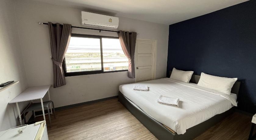 Image of Double Queen Room with Balcony - No Pets 0