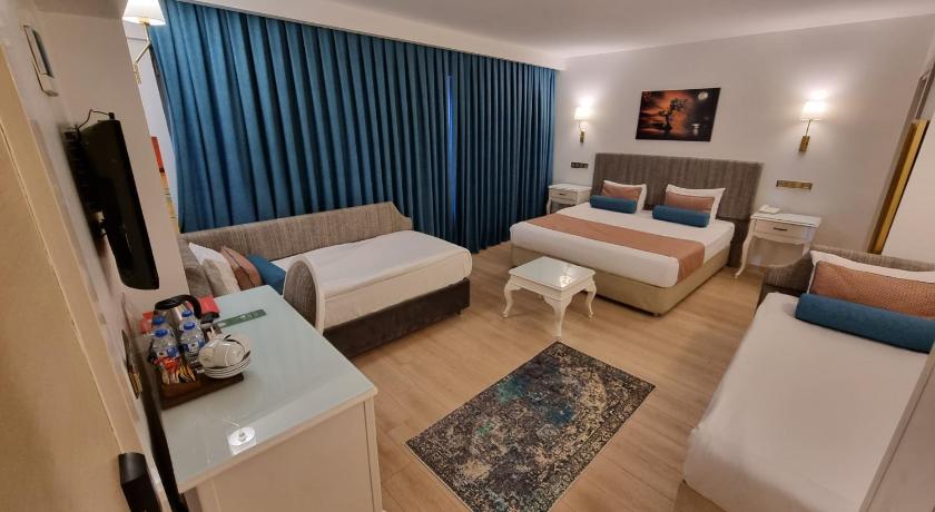 Taximtown Hotel - image 9