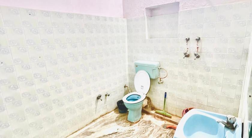 Image of Deluxe Double Room with Fan 5