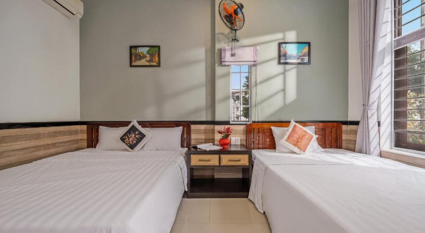 Image of Triple Room with Garden View 1