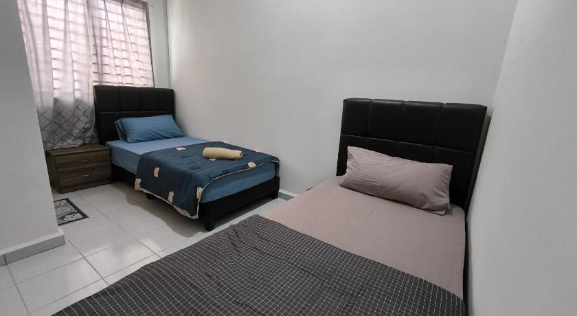 바투 파핫 바투 파핫의 프라이빗 하우스 (m², 침실 4개, 프라이빗 욕실 3개) (Batu Pahat Putera Indah Homestay 13 pax by Ngio ) 4성급 게스트하우스 객실