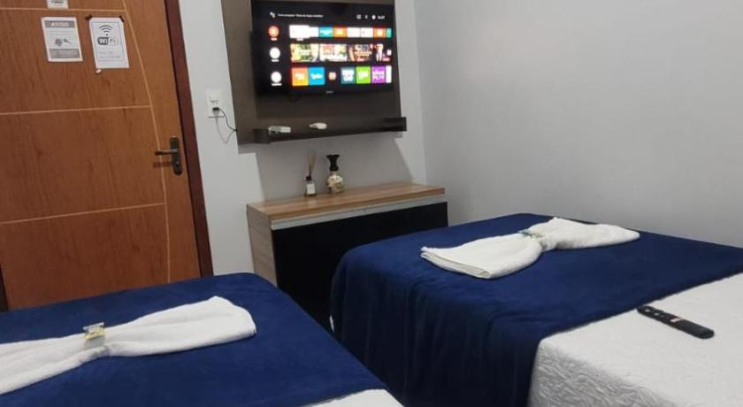 Quarto 4 economico duplo proximo do aeroporto com ar condicionado e wifi gratis