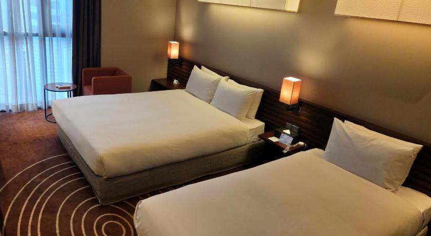 Image of Deluxe Family Twin Room Half Ocean View 9