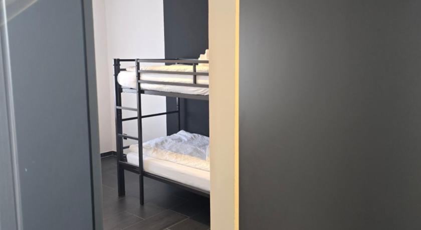 Photo de HOSTEL PD23 ALTE FEUERWACHE I 3min CityHospital I 50m Supermarkt I SmartTV I P I Gemeinschaftskuche  - Réservation à prix Agoda