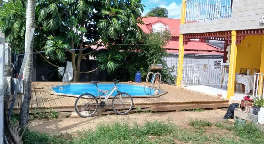 照片: Appartement charmant à Sainte-Rose avec piscine - Agoda折扣预订