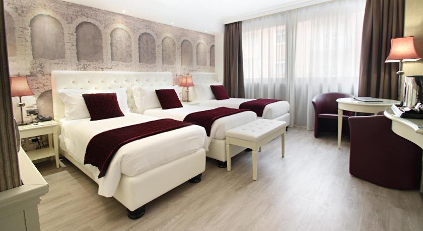 Фото: Трехместный номер Делюкс (Deluxe Triple Room) 0