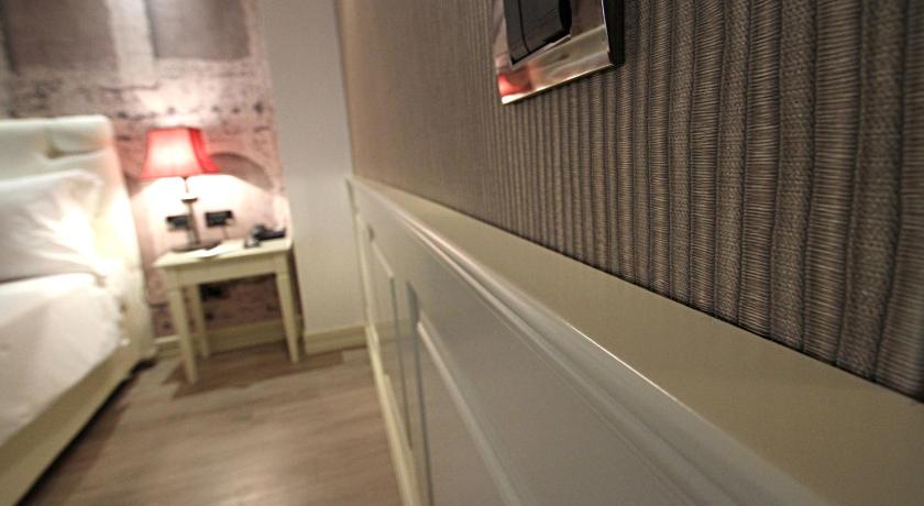 Фото: Трехместный номер Делюкс (Deluxe Triple Room) 6