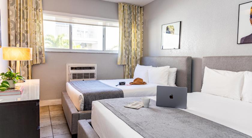Immagine di Suite Queen con 1 Camera da Letto Matrimoniale (One Bedroom Double Queen Suite) 0