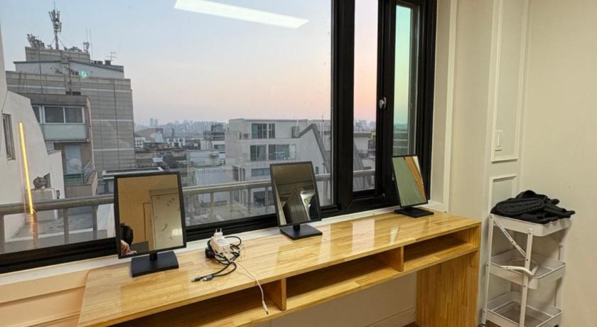 서울 K 웨이브 게스트하우스 온리 피메일 인 홍대 2 (K wave Guesthouse Only Female in Hongdae 2) 3성급 호텔 스위트룸