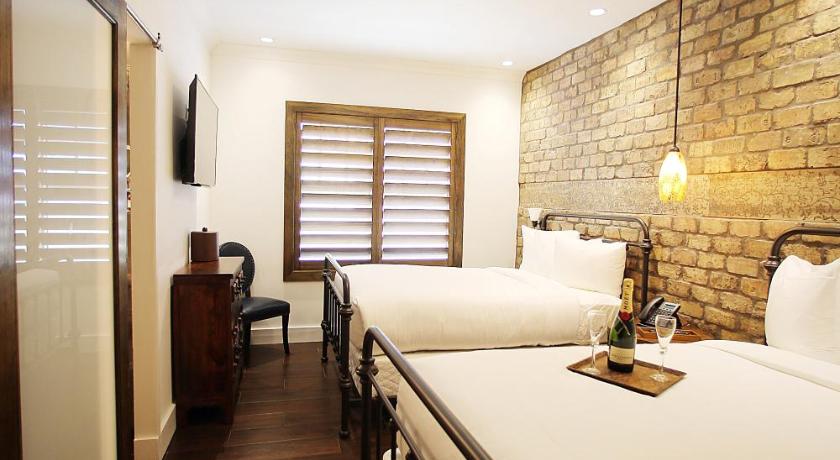 Immagine di Deluxe Doppia con 2 Letti Matrimoniali (Deluxe Double Room with Two Double Beds) 16