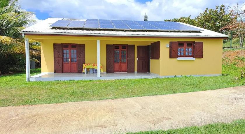 Photo de Maison spacieuse à Petit-Bourg avec jardin - Réservation à prix Agoda