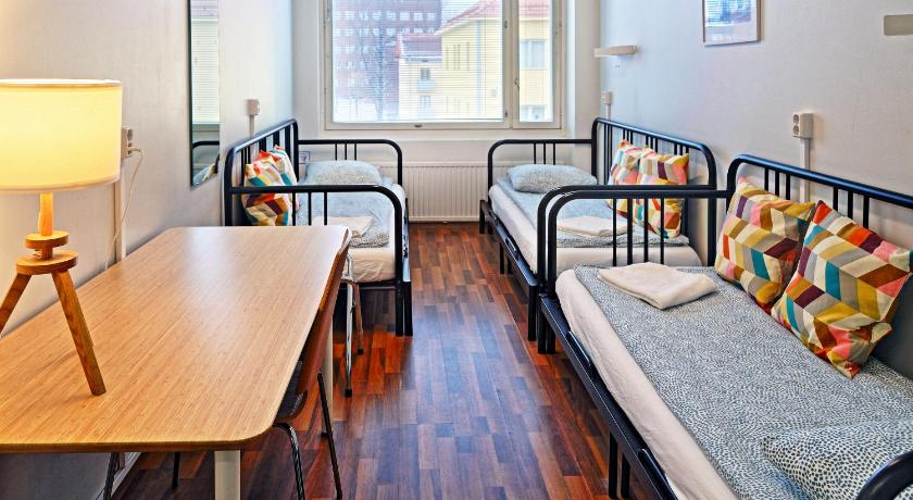 Image of Triple Room with Shared Bathroom 0