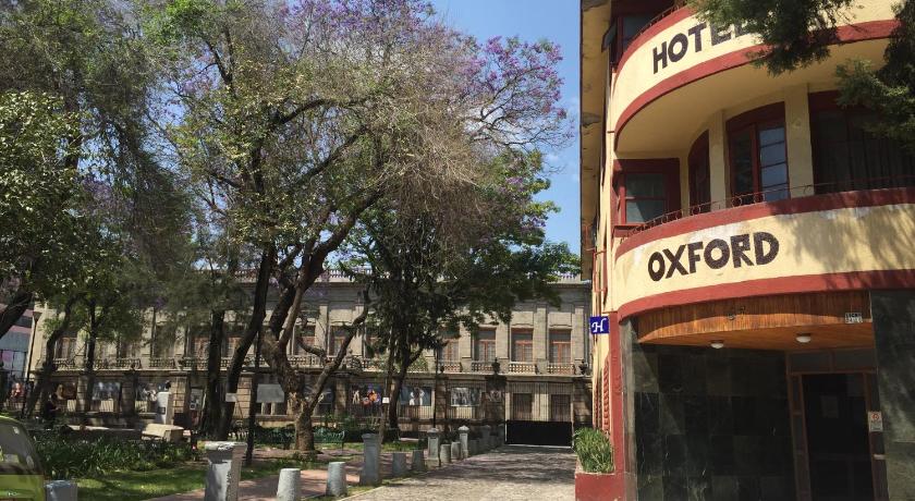 a large building with a tree in front of it, Hotel Oxford in Mexico City