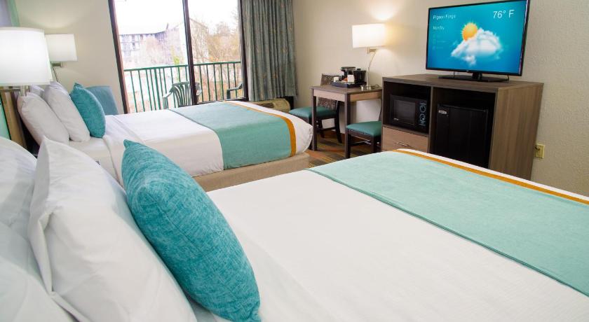 Image of Queen Room with Two Queen Beds and Balcony 0